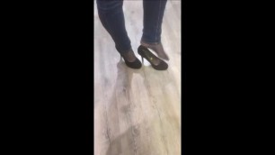 Women try High Heel in a Shop