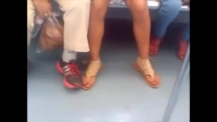 Beautiful Girl with Sandals on Mexican Subway