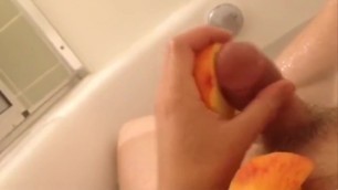 Guy Fucks a Piece of Fruit in the Bathtub and Cums