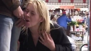 girl giving a blowjob in public