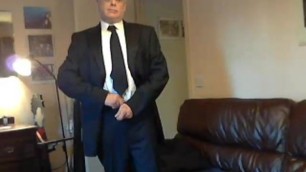 Wank in suit